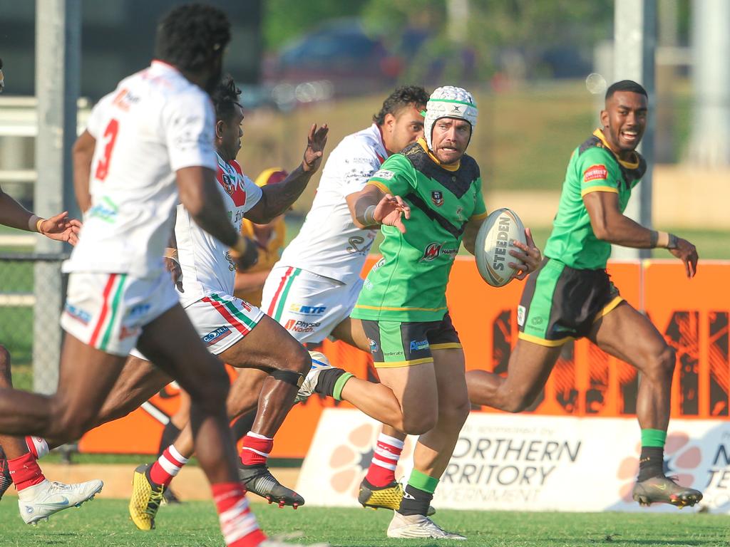 Palmerston captain Alex Johnson braces for a tackle in the NRL NT A-Grade match between Nightcliff Dragons and Palmerston Raiders. Picture: Glenn Campbell