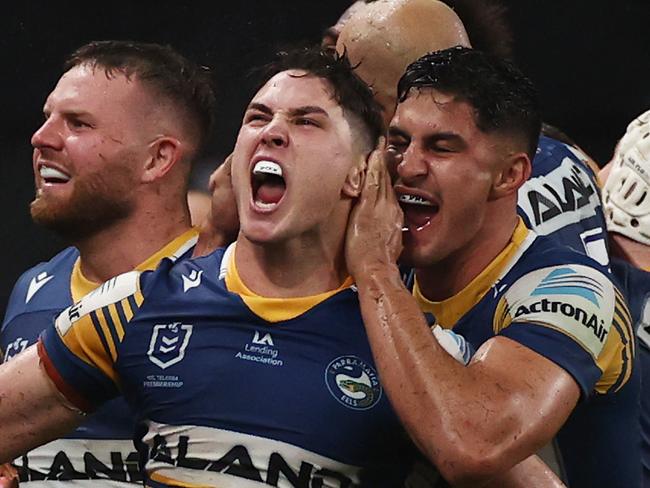 *** BESTPIX *** SYDNEY, AUSTRALIA - MARCH 18:  Mitchell Moses of the Eels celebrates after Maika Sivo of the Eels scores a try during the round two NRL match between the Parramatta Eels and the Melbourne Storm at Bankwest Stadium on March 18, 2021, in Sydney, Australia. (Photo by Cameron Spencer/Getty Images)