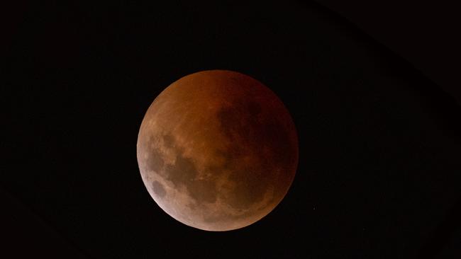 100 lucky ticket holders will get the opportunity to watch a total lunar eclipse — known as a blood moon. Picture: Geoff Wyatt