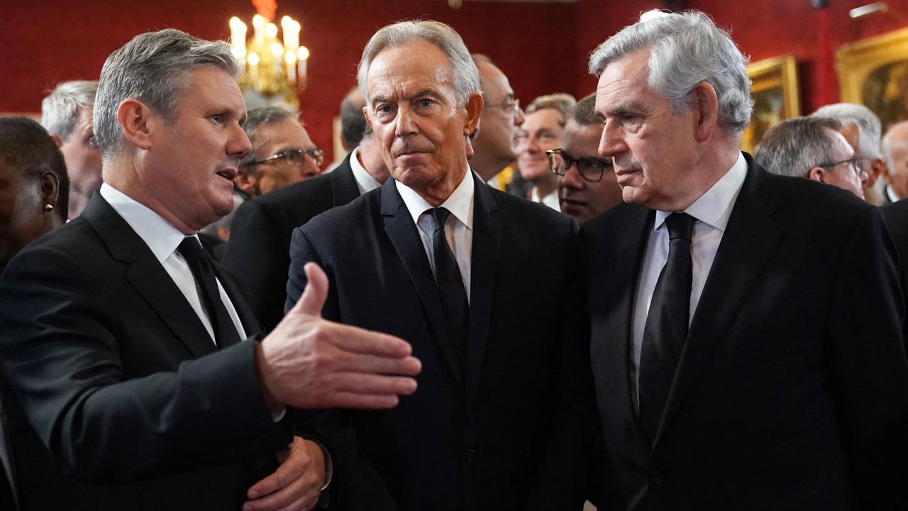 Britain's Labour leader Sir Keir Starmer, Britain's former Prime Ministers Tony Blair and Gordon Brown speak together ahead of a meeting of the Accession Council inside St James's Palace in London. Picture: AFP