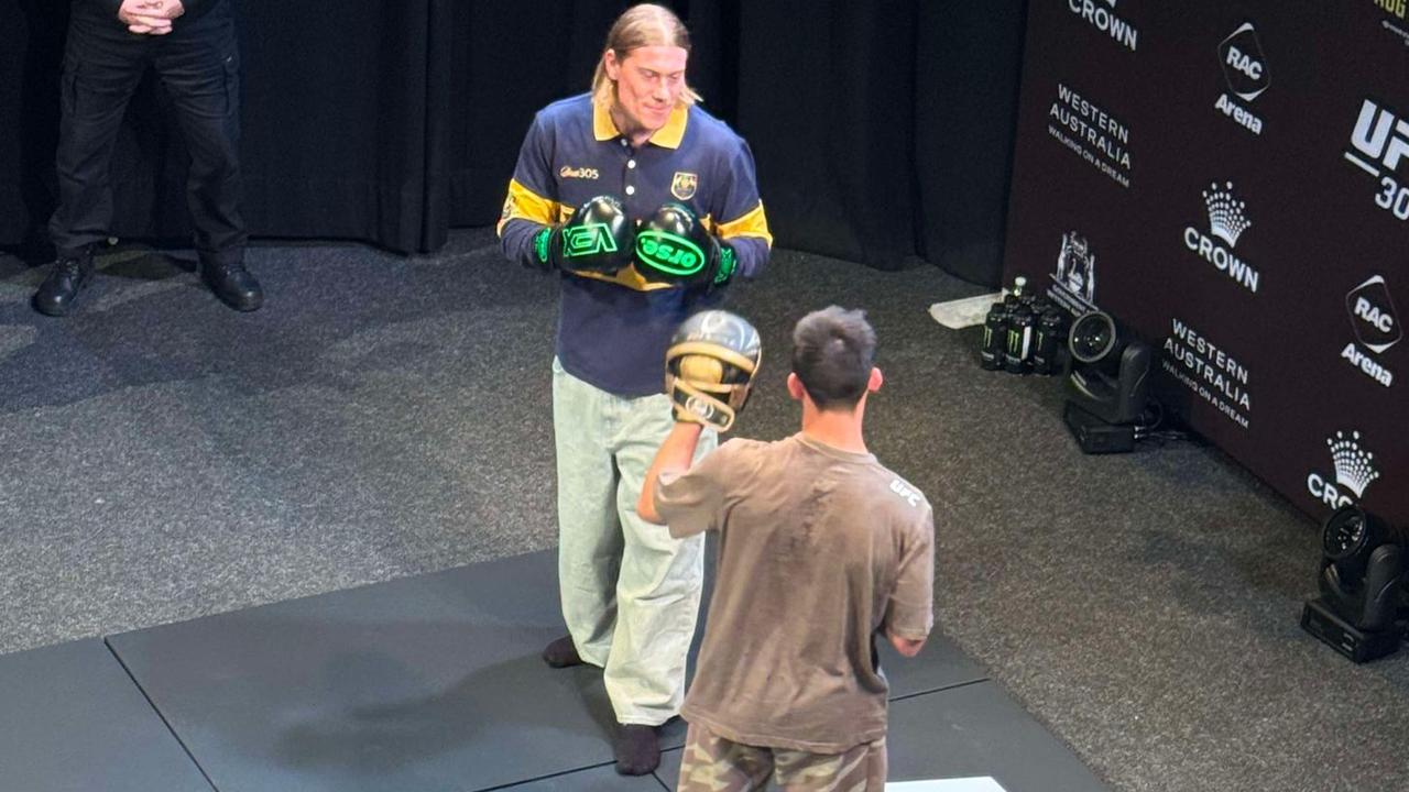 West Coast Eagles star Harley Reid hits the pads with Australian fighter Steve Erceg during UFC Open Workout Sessions in the lead-up to this weekend’s UFC 305 in Perth.