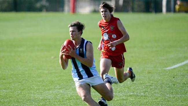 Immanuel’ Tom Jennings, pictured in action during a clash with Trinity earlier this year, was best for his side in its victory against St Michael’s on Saturday. Picture: AAP/Morgan Sette