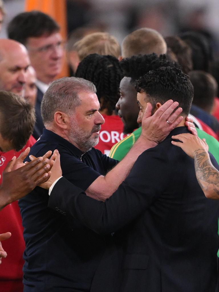 Ange Postecoglou embraces Man United manager Ruben Amorim in classy scenes. (Photo by David Ramos/Getty Images)