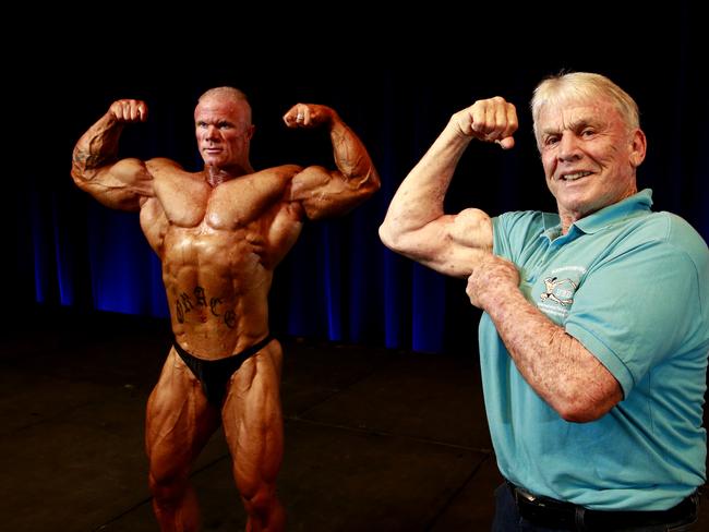 Ex-bodybuilder Paul Graham posing with the biggest bodybuilder at a competition in in 2015. Paul Graham used to compete against Arnold Schwarzenegger. Picture: Jerad Williams