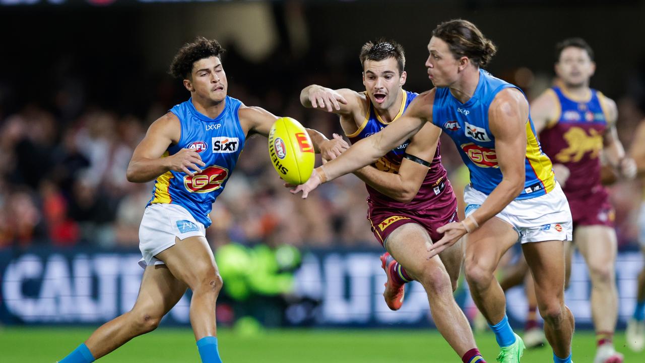 Powell (left) in action against the Lions. (Photo by Russell Freeman/AFL Photos via Getty Images)