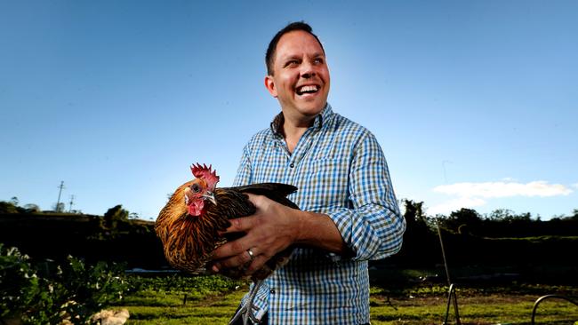 Chef Alastair McLeod with Phoenix the chook at Loop Growers, Draper. Picture: Tara Croser