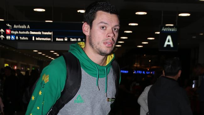 Boomers star Jason Cadee arrives back in Sydney from the Philippines.