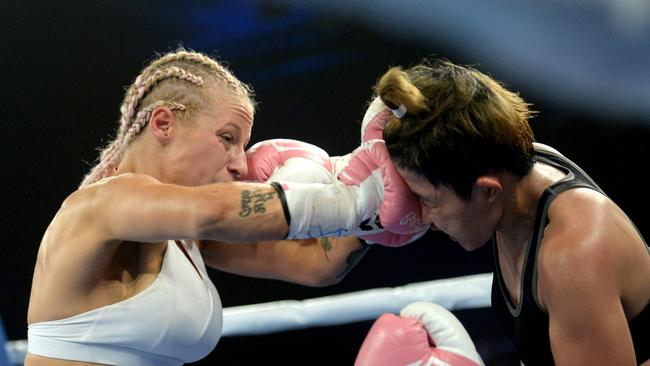 Ebanie Bridges (left) and Mahiecka Pareno in action during the Star of the Ring charity fight night at Hordern Pavilion. Picture: AAP Image/Jeremy Piper