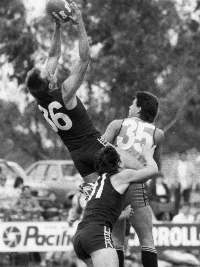 John Schneebichler soars for a spectacular mark for South Adelaide against Sturt in 1986. Picture: Stuart Hannagan