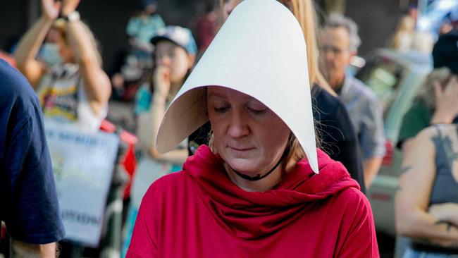 A woman dressed as a character from The Handmaid’s Tale protests with abortion rights activists in Portland, Oregon after the US Supreme Court struck down Roe v Wade, overturning the right to abortion. Picture: AFP