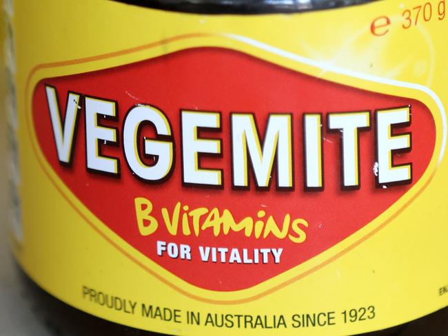 SYDNEY, AUSTRALIA - NewsWire Photos FEBRUARY 10, 2022: A jar of Vegemite and a Cheese and Vegemite sandwich. Vegemite is undertaking a fresh bid to appeal to wider audiences with the launch of a new cheesy staple. Vegemite & Cheese, made up of the original spread mixed with cream cheese, is aimed at customers who have yet to try the Australian delicacy. The new offering is set to replace Cheesybite and will roll out across supermarkets from Thursday.Picture: NCA NewsWire / Damian Shaw