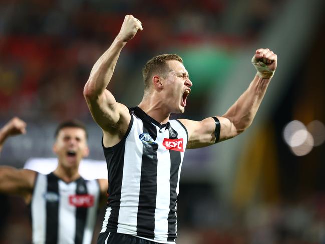 Nathan Kreuger celebrates a goal for the Pies last year. Picture: Chris Hyde/Getty Images