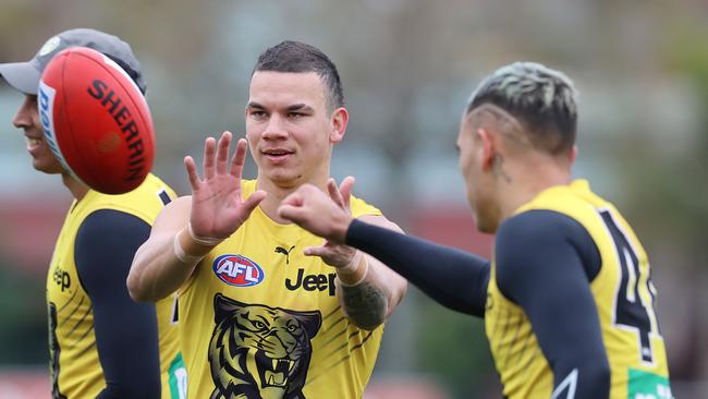 Daniel Rioli struggles against Brayden Maynard. Picture: Michael Klein