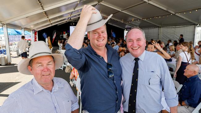 Colin Boyce (Liberal National Party candidate for Flynn) and Deputy Prime Minister Barnaby Joyce with Jake who bid $6100 for his Akubra. Picture Brad Hunter, Office of the Deputy PM