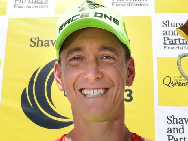 Coolangatta Gold 2023 winner Ali Day holds the trophy to claim his ninth title. Picture: Supplied