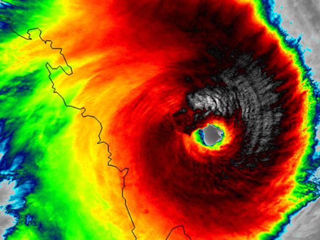 This image obtained from the National Oceanic and Atmospheric Administration (NOAA) shows VIIRS infrared imagery from Tropical Storm Marcia as it approaches the eastern coast of Australia on February 19, 2015. A powerful cyclone roared ashore in a heavily populated area of Australia on February 20, 2015 with authorities warning of a "calamity" as howling winds and torrential rain saw residents hunkering down to wait out the terrifying conditions. Tropical Cyclone Marcia slammed into the Queensland coast just after 2200 GMT, February 19, 2015 having been upgraded to a category five, the most severe. Hundreds of people were cowering in cyclone shelters although there were no immediate reports of significant damage. AFP PHOTO / NOAA / NASA/ RAMMB / CIRA == RESTRICTED TO EDITORIAL USE / MANDATORY CREDIT: "AFP PHOTO / NOAA / NASA/ RAMMB / CIRA" / NO A LA CARTE SALES / NO MARKETING / NO ADVERTISING CAMPAIGNS / DISTRIBUTED AS A SERVICE TO CLIENTS ==