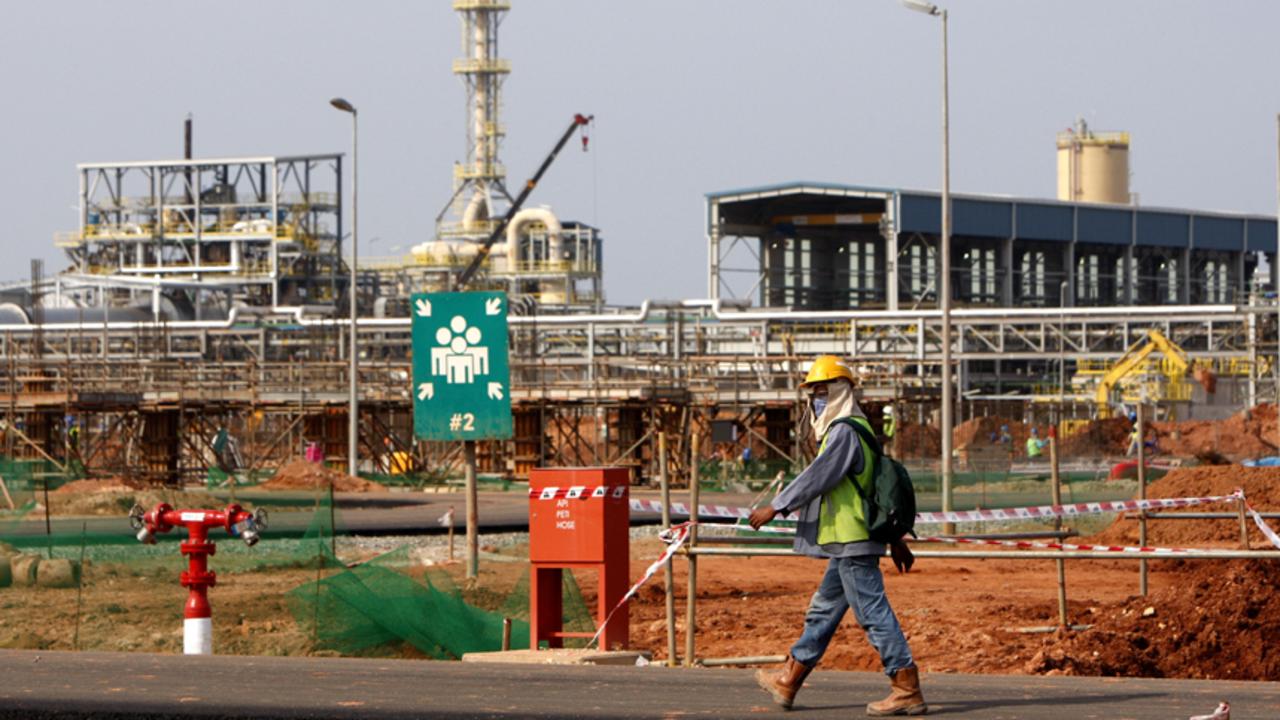 A worker walks at the site of Lynas rare earths plant under construction in Gebeng, eastern Malaysia. Picture: AP Photo/Lai Seng Sin,