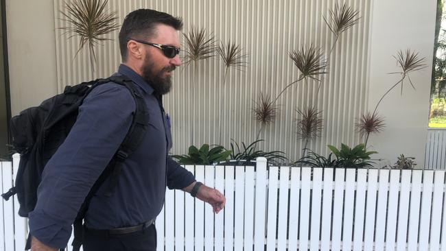 Police officer Jarrod Mathison leaves the Darwin Local Court after pleading guilty to drink driving.