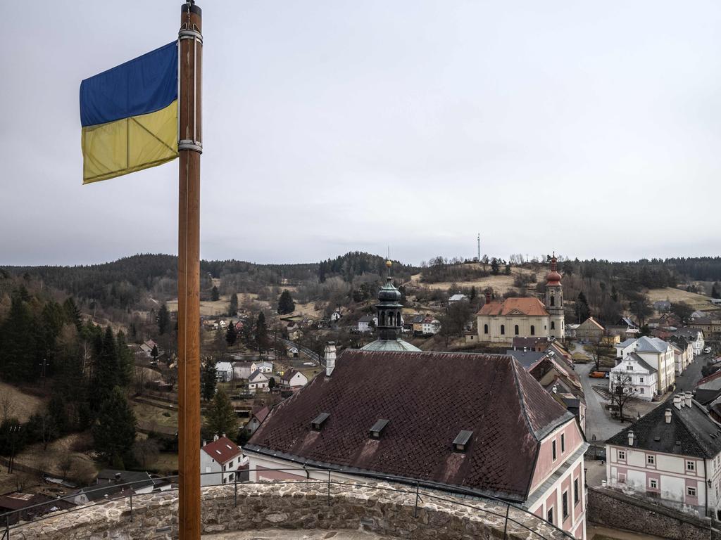 The Ukrainian flag flutters on the flagpole of the Becov nad Teplou castle. Picture: Michal Cizek/AFP