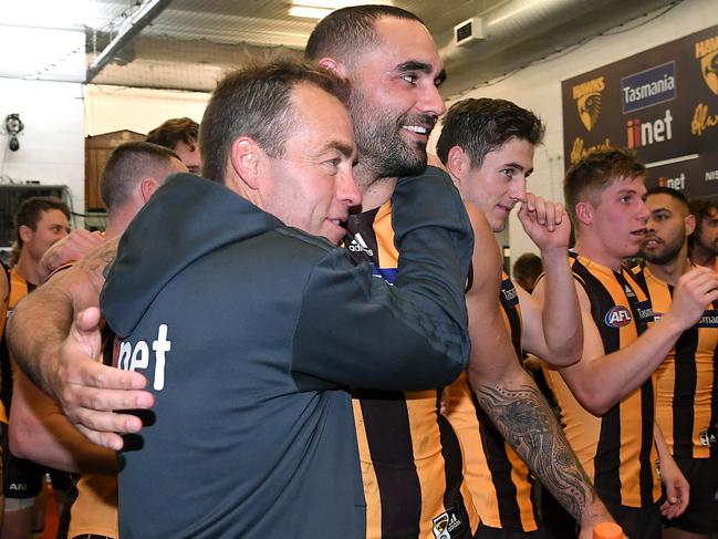 MELBOURNE, AUSTRALIA - MAY 12: Hawks head coach Alastair Clarkson celebrates with Shaun Burgoyne after winning the round eight AFL match between the Hawthorn Hawks and the Greater Western Sydney Giants at Melbourne Cricket Ground on May 12, 2019 in Melbourne, Australia. (Photo by Quinn Rooney/Getty Images)