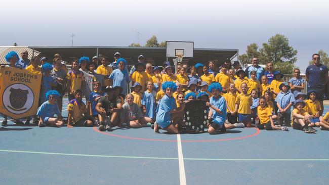 The Origin coach (right) made local schoolkids’ day.