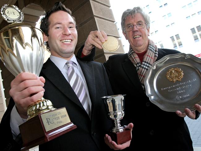 Derwent Valley Concert Band drum major Chris Rice and musical director Layton Hodgetts with some of the trophies and awards won in Europe in 2008. Picture: Sam Rosewarne