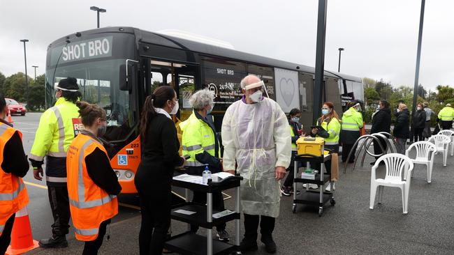 Buses converted into mobile Covid vaccination clinics were launched in Auckland last year to vaccinate as many people as possible. Picture: Phil Walter/Getty Images