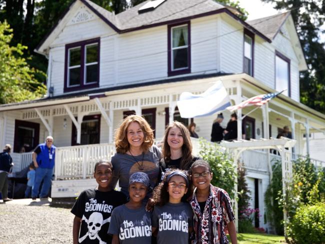 This June 2014 photo shows Devonte Hart with his family at the annual celebration of "The Goonies" movie in Astoria, Oregon. Picture: AP