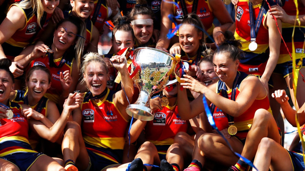 ADELAIDE, AUSTRALIA - APRIL 09: The Adelaide Crows pose for their premiership photo during the 2022 AFLW Grand Final match between the Adelaide Crows and the Melbourne Demons at Adelaide Oval on April 09, 2022 in Adelaide, Australia. (Photo by Dylan Burns/AFL Photos via Getty Images)
