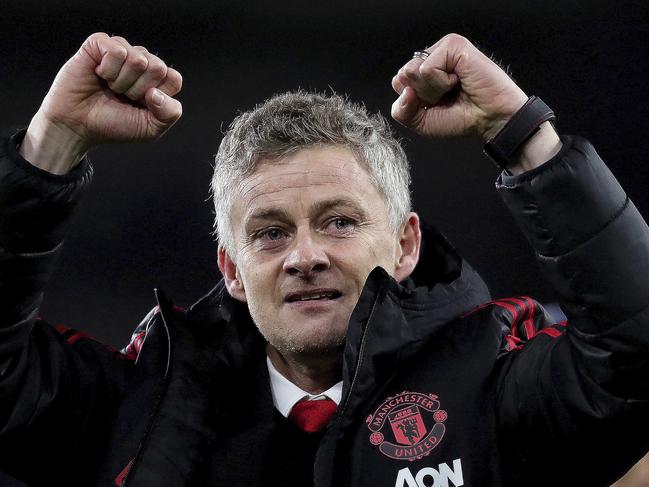 Manchester United manager Ole Gunnar Solskjaer celebrates his win against Cardiff City after the English Premier League match between Cardiff City and Manchester United at the Cardiff City Stadium in Cardiff, Wales, Saturday Dec. 22, 2018. (AP Photo/ Jon Super)