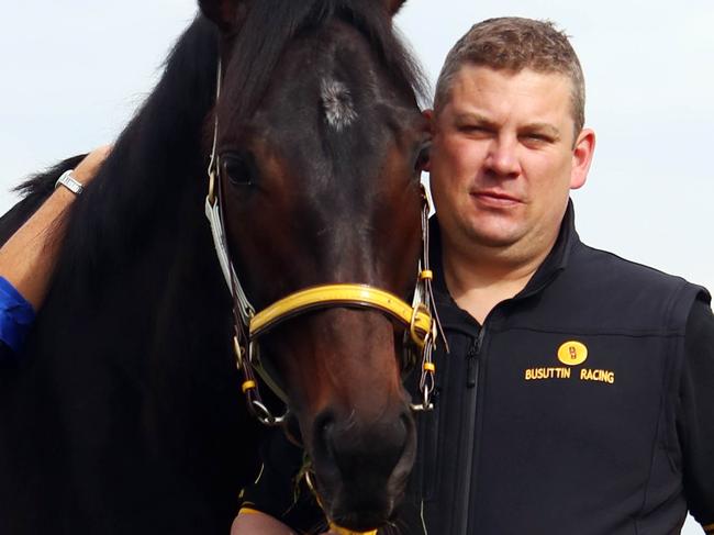 02/11/19 Trainers Trent Busuttin with his partner Natalie Young and their Melbourne cup runner Mirage Dancer. Aaron Francis/The Australian