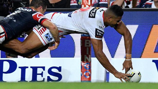 Nene Macdonald’s try was just another Bunker error. (AAP Image/Dan Himbrechts)