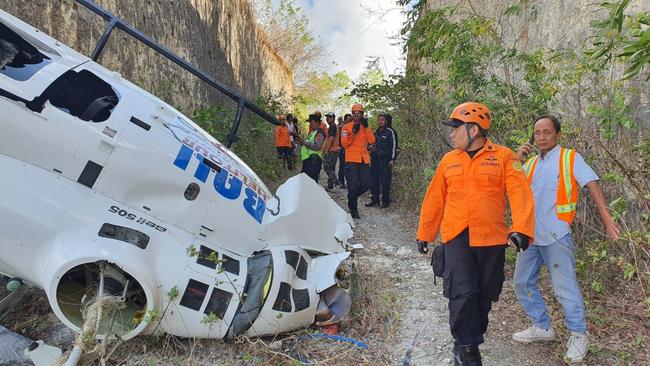 Mr Harris said he remembered hitting trees and a cliff, before the helicopter ended upside down. No-one was killed and several people, including Mr Harris, were taken to hospital. Picture: Supplied / Indonesian Search &amp; Rescue Agency (BASARNAS)