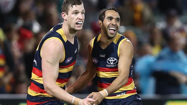 ADELAIDE, AUSTRALIA — JULY 07: Josh Jenkins and Eddie Betts of the Crows celebrate a goal during the round 16 AFL match between the Adelaide Crows and the Western Bulldogs at Adelaide Oval on July 7, 2017 in Adelaide, Australia. (Photo by Ryan Pierse/Getty Images)