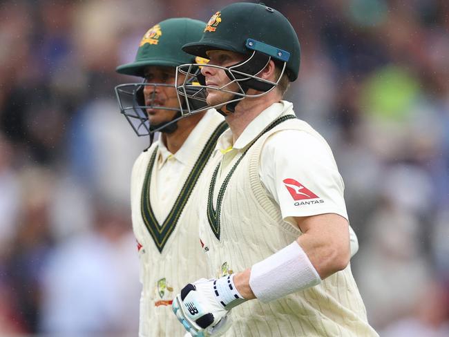 LONDON, ENGLAND - JUNE 30: Steve Smith and Usman Khawaja of Australia leave the field due to a rain delay during Day Three of the LV= Insurance Ashes 2nd Test match between England and Australia at Lord's Cricket Ground on June 30, 2023 in London, England. (Photo by Ryan Pierse/Getty Images)