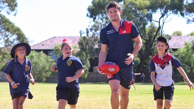 Angus Brayshaw with year 5 students from Bentleigh West Primary School for a community camp. Picture: Hamish Blair