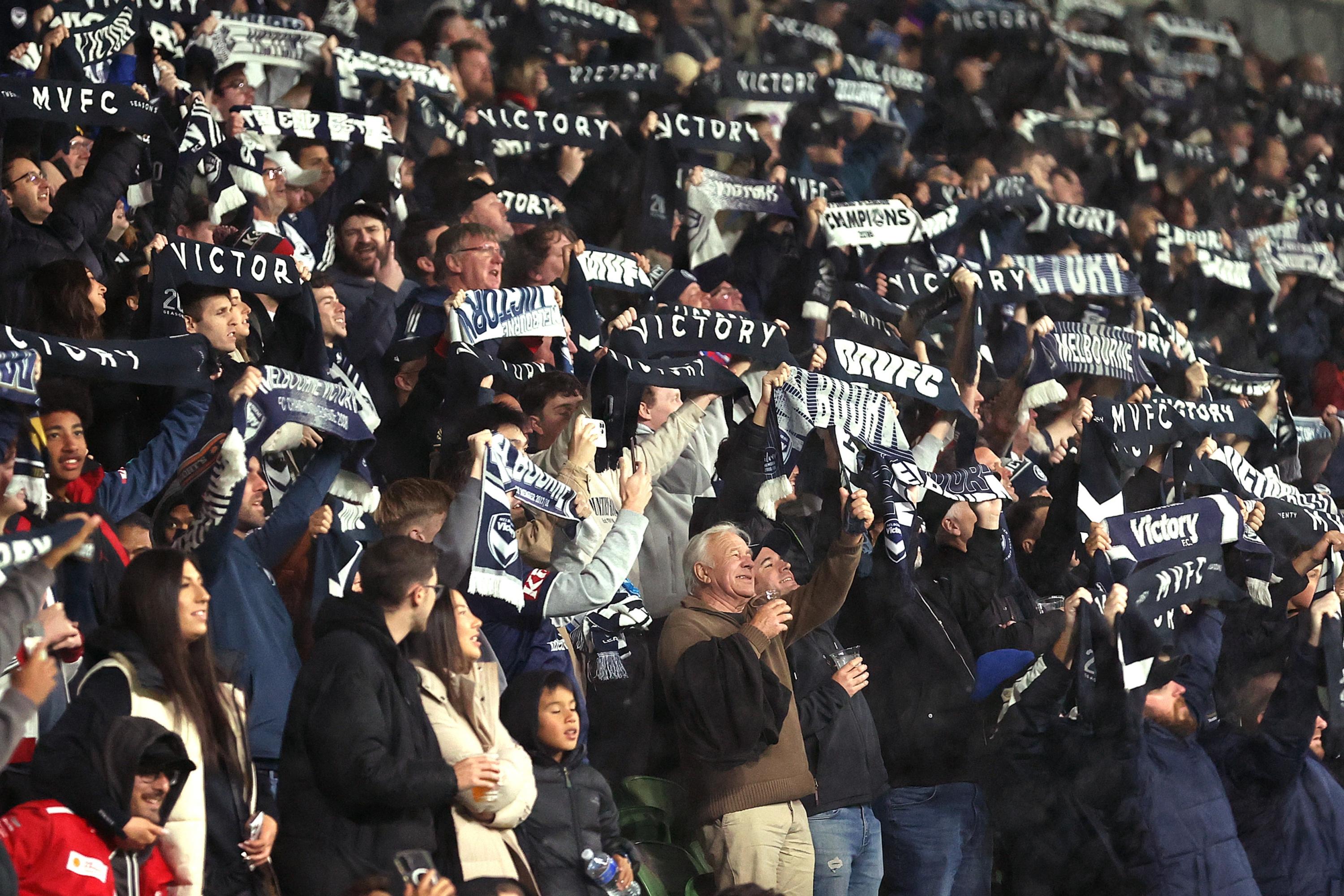 Victory fans show support during the Victory’s semi final against Auckland FC. Picture: Kelly Defina/Getty Images