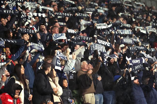 Victory fans show support during the Victory’s semi final against Auckland FC. Picture: Kelly Defina/Getty Images