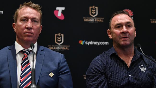 Roosters coach Trent Robinson (left) and Raiders coach Ricky Stuart have been at war for years