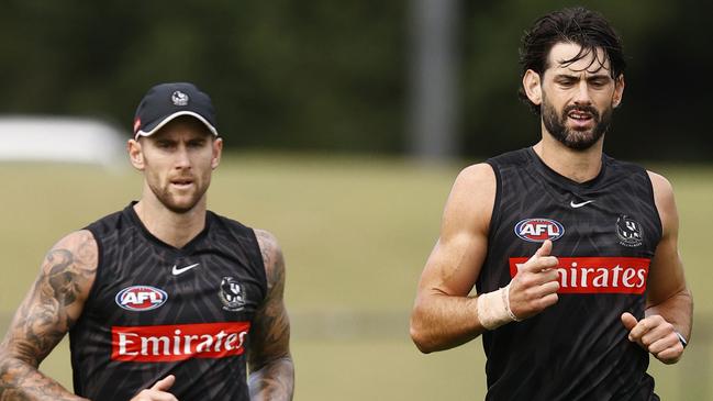 Brodie Grundy, right, could reclaim the KFC SuperCoach ruck crown in 2022. Picture: Darrian Traynor/Getty Images