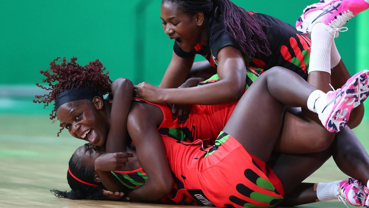 Malawi celebrate winning the Netball match between New Zealand and Malawi