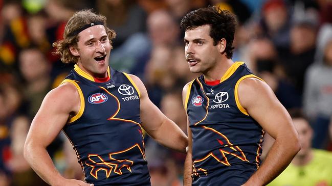 Sam Berry (left) and Darcy Fogarty of the Crows.