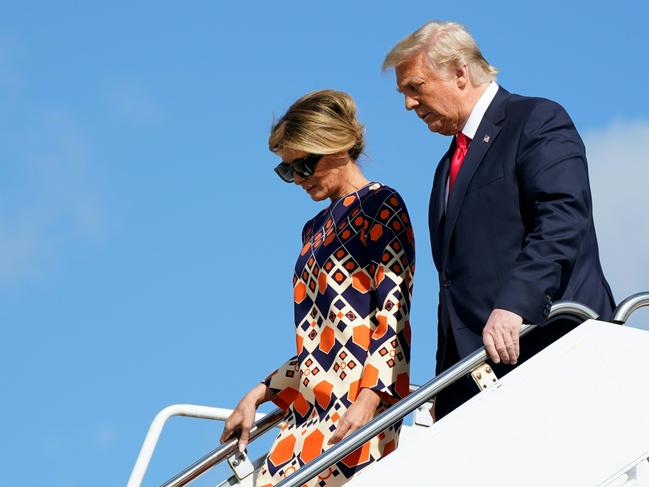 Melania Trump leaves Air Force One for the last time in her $A5000 ‘Mar-a-Lago’ outfit. Picture: AFP