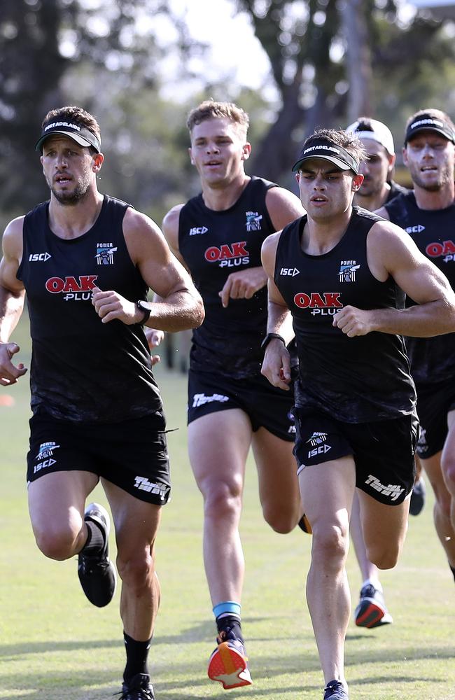 Travis Boak and Karl Amon lead a lap around Noosa Oval. Picture: Sarah Reed.