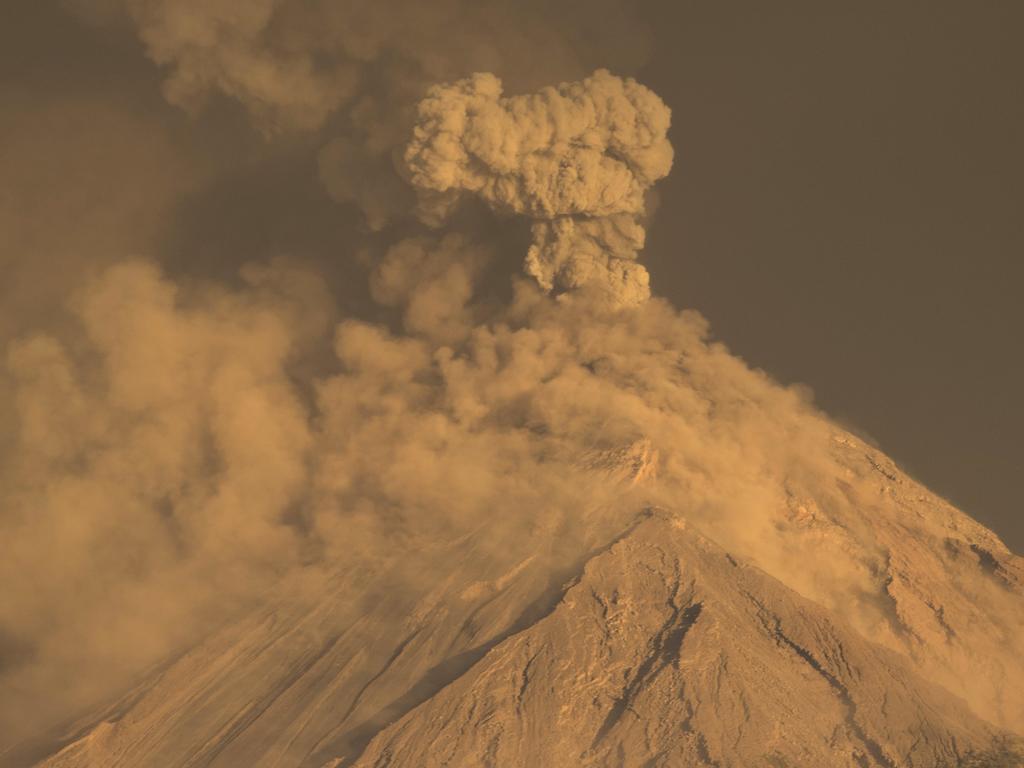 The Volcan de Fuego, or Volcano of Fire, spews hot molten lava and ash from its crater in Escuintla, Guatemala. Picture: AP Photo/Moises Castillo