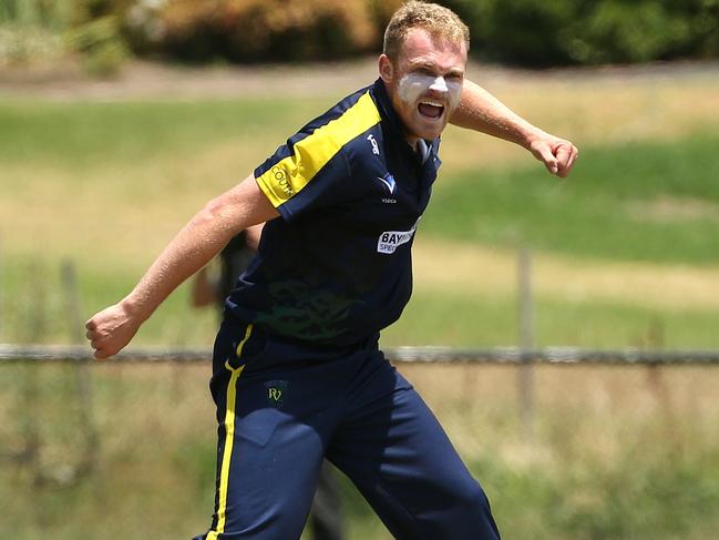 Dayne Smith rips into celebration after claiming a wicket for Plenty Valley on Saturday. Picture: Hamish Blair