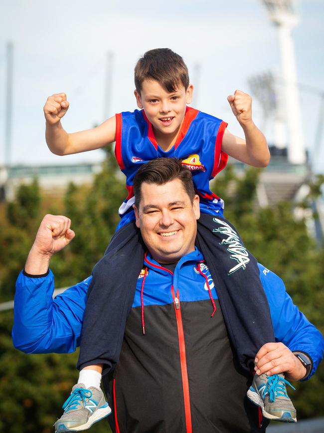 Western Bulldogs supporters Stephen and Hudson, 8. Picture: Mark Stewart