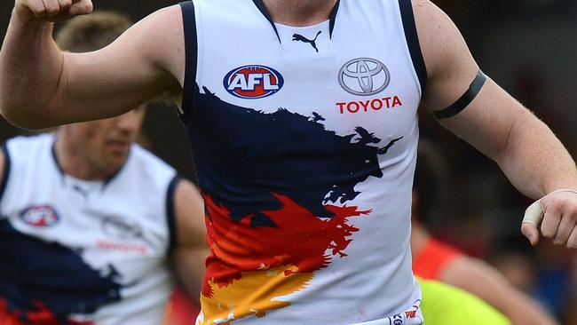 Crows player Tom Lynch reacts after kicking a goal  during the Round 14 AFL match between the Gold Coast Suns and the Adelaide Crows at Metricon Stadium on the Gold Coast, Saturday, June 29, 2013. (AAP Image/Dave Hunt) NO ARCHIVING, EDITORIAL USE ONLY