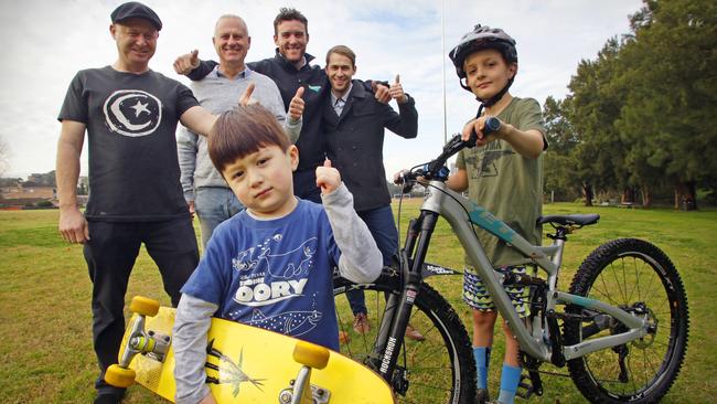 Andrew Alcorn (far left) with son Ash (front), Cr Roy Maggio (second from left), Ben Drayton (third from right), Kendrick Thompson (second from right), Jonny Valenta (on bike). Picture: Phil Rogers