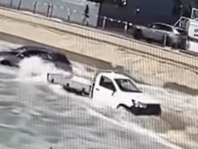 Two cars were caught in the swell as the carpark at Currumbin SLSC was consumed by the ocean. Picture: Instagram/@nicka35